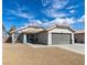 Charming single-story home featuring a well-maintained yard and a two-car garage at 1334 Shimmering Glen Ave, Henderson, NV 89014