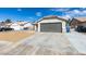 Charming single-Gathering home with a large driveway and two-car garage for convenient parking at 1334 Shimmering Glen Ave, Henderson, NV 89014