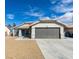 Charming single-story home featuring a well-maintained yard and a two-car garage at 1334 Shimmering Glen Ave, Henderson, NV 89014