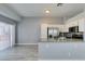 Bright kitchen featuring stainless appliances, backsplash, sliding glass doors and backyard access at 1334 Shimmering Glen Ave, Henderson, NV 89014