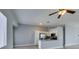 Well-lit kitchen featuring stainless appliances, a backsplash, and a breakfast bar at 1334 Shimmering Glen Ave, Henderson, NV 89014