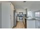 Well-equipped kitchen with stainless steel appliances, granite counters, and stylish backsplash at 1334 Shimmering Glen Ave, Henderson, NV 89014