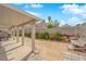 Spacious backyard with a covered patio offering ample room for relaxation and leisure at 1431 Broad Arrow Dr, North Las Vegas, NV 89032