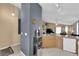 Open kitchen area with view to the living room, providing a social and functional space at 1431 Broad Arrow Dr, North Las Vegas, NV 89032