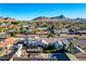 An aerial view of the property featuring a pool, patio, and landscaped yard at 1630 Sundown Dr, Henderson, NV 89002