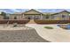 Paver patio and meticulous landscape for an entertainer's dream yard; perfect for grilling and chilling at 1630 Sundown Dr, Henderson, NV 89002