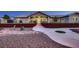 Paver patio and meticulous landscape for an entertainer's dream yard; perfect for grilling and chilling at 1630 Sundown Dr, Henderson, NV 89002