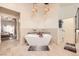Luxurious bathroom with a freestanding tub, modern fixtures, and serene ambiance at 1630 Sundown Dr, Henderson, NV 89002