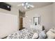Comfortable bedroom featuring a ceiling fan, closet and a dresser at 1630 Sundown Dr, Henderson, NV 89002