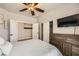 Bedroom showcasing neutral tones, a ceiling fan, closet and natural light at 1630 Sundown Dr, Henderson, NV 89002