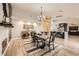 Open-concept dining space showcasing stylish furnishings and seamlessly connecting to the kitchen area at 1630 Sundown Dr, Henderson, NV 89002