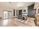 Elegant dining room with large windows, modern chandelier, and stylish decor for hosting gatherings at 1630 Sundown Dr, Henderson, NV 89002