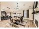 Cozy dining area featuring stylish furnishings and an open layout leading to the kitchen at 1630 Sundown Dr, Henderson, NV 89002