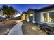Charming single-story home with desert landscaping, and a welcoming walkway at 1630 Sundown Dr, Henderson, NV 89002
