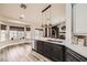 Modern kitchen featuring stainless steel appliances, custom cabinets, and a bright breakfast nook at 1630 Sundown Dr, Henderson, NV 89002