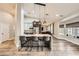 Open-concept kitchen with a large island, pendant lights, and seating for entertaining at 1630 Sundown Dr, Henderson, NV 89002