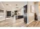 Open floorplan showcases dining, kitchen, and living area that creates a great space for Gathering and friends at 1630 Sundown Dr, Henderson, NV 89002
