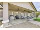 Outdoor patio area featuring a built-in grill, dining table and recessed lighting at 1630 Sundown Dr, Henderson, NV 89002