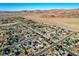 Street view of residential neighborhood with desert landscaping and mountain views at 1630 Sundown Dr, Henderson, NV 89002