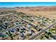 Street view of residential neighborhood with desert landscaping and mountain views at 1630 Sundown Dr, Henderson, NV 89002