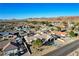 Street view of a single-Gathering home with desert landscaping and view of mountains at 1630 Sundown Dr, Henderson, NV 89002