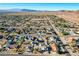 Street view of residential neighborhood with desert landscaping and mountain views at 1630 Sundown Dr, Henderson, NV 89002