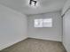 This cozy bedroom offers plush carpeting and a sunlit window for a bright and inviting space at 1900 E Oakey Blvd, Las Vegas, NV 89104