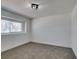 This cozy bedroom offers plush carpeting and a sunlit window for a bright and inviting space at 1900 E Oakey Blvd, Las Vegas, NV 89104