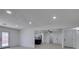 Bright and airy living area with fireplace, new flooring, and access to kitchen at 1900 E Oakey Blvd, Las Vegas, NV 89104