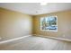 Bright bedroom with ample natural light and new flooring at 2032 Kingswinford Dr, North Las Vegas, NV 89032