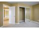 Bedroom featuring a mirrored closet and access to other rooms in the home at 2032 Kingswinford Dr, North Las Vegas, NV 89032