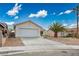 A well maintained single story home in Cambridge Heights with an attached two car garage at 2032 Kingswinford Dr, North Las Vegas, NV 89032