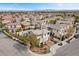 Aerial view of a home showcasing its landscaped yard, swimming pool, and community setting at 2098 Valley Sand St, Las Vegas, NV 89135