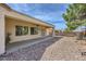 Covered patio with ceiling fan and landscaped backyard at 2148 Shadow Canyon Dr, Henderson, NV 89044