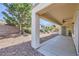 Covered patio with ceiling fan and landscaped backyard at 2148 Shadow Canyon Dr, Henderson, NV 89044