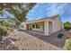 Landscaped backyard with covered patio at 2148 Shadow Canyon Dr, Henderson, NV 89044