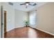 Inviting bedroom with wood floors, a fan and window at 2148 Shadow Canyon Dr, Henderson, NV 89044