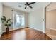 View of bedroom showing wood-look floor and contemporary ceiling fan at 2148 Shadow Canyon Dr, Henderson, NV 89044