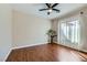 View of bedroom showing wood-look floor and contemporary ceiling fan at 2148 Shadow Canyon Dr, Henderson, NV 89044