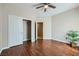 Bedroom with wood floors, closet and entry door at 2148 Shadow Canyon Dr, Henderson, NV 89044