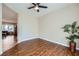 Living room with wood-look floors and neutral color scheme at 2148 Shadow Canyon Dr, Henderson, NV 89044