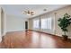 Spacious living room with wood-look floors and natural light at 2148 Shadow Canyon Dr, Henderson, NV 89044