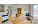 Eat-in kitchen with tile floors, wood cabinets, and lots of natural light at 2194 King Mesa Dr, Henderson, NV 89012