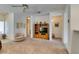 Large living room area with neutral carpet, bright light, and open layout at 2194 King Mesa Dr, Henderson, NV 89012
