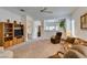 Inviting living room with neutral carpet, bright light and an open layout at 2194 King Mesa Dr, Henderson, NV 89012