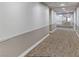 Spacious hallway with neutral walls and patterned carpeting at 2240 Village Walk Dr # 2207, Henderson, NV 89052