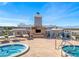 Enjoy a rooftop terrace with hot tubs, a fireplace, and seating area at 2240 Village Walk Dr # 2207, Henderson, NV 89052