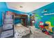 bedroom featuring a bunkbed and colorful wall art and gray carpet at 2410 Morocco Ave, North Las Vegas, NV 89031