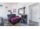 Comfortable bedroom with luxury plank flooring and natural light at 2410 Morocco Ave, North Las Vegas, NV 89031