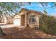 Beautiful single-story home with a well-kept yard, a spacious driveway, and a charming entrance at 2410 Morocco Ave, North Las Vegas, NV 89031
